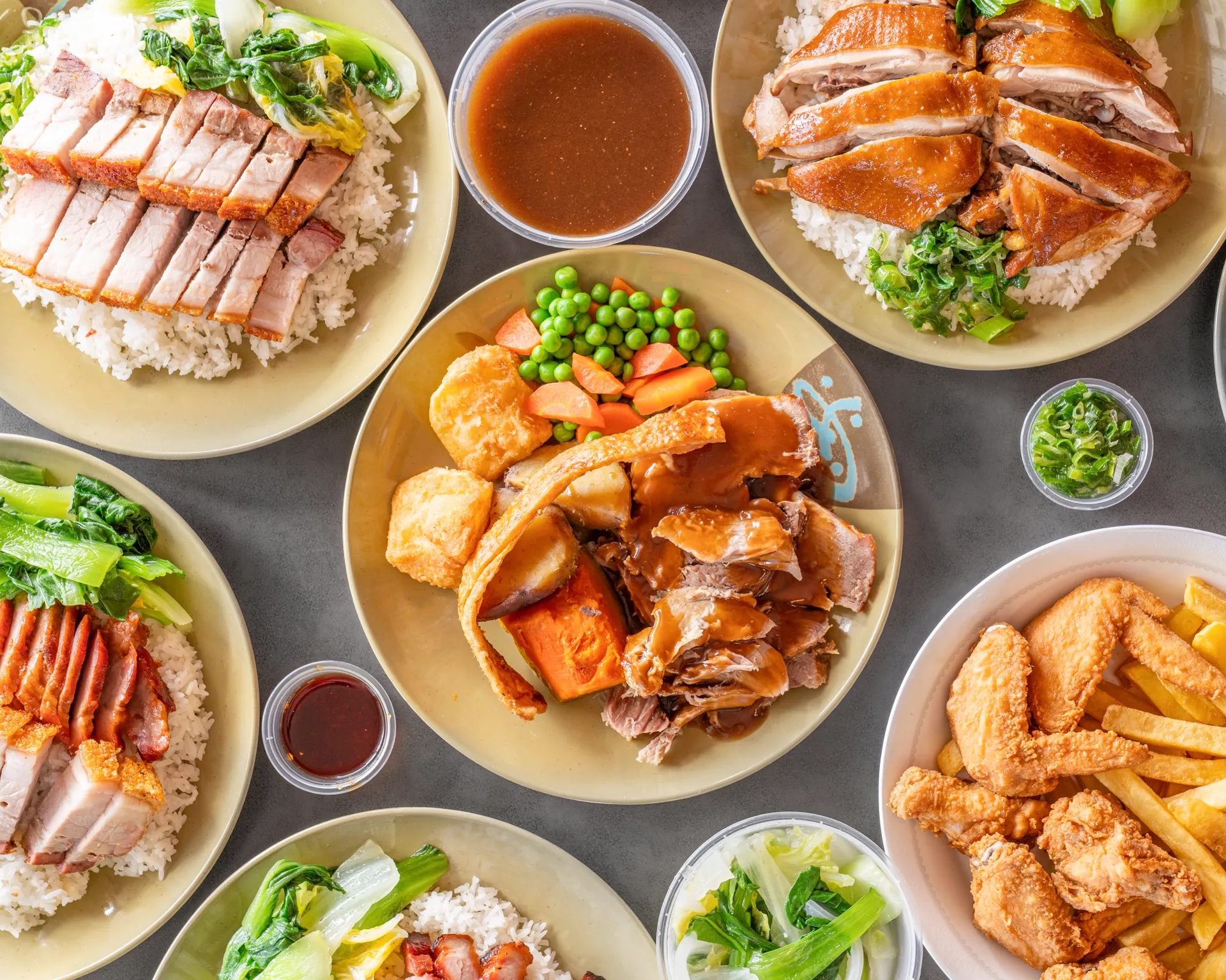 Tasty Roast — Hong Kong style BBQ spread with roast pork, char siu, chicken nibbles, and roast meals